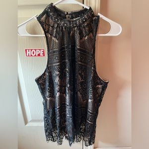 Sleeveless lace blouse